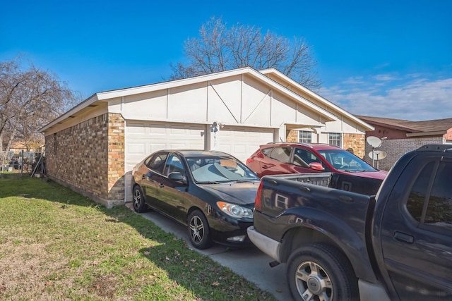 view of side of home with a lawn