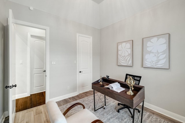 office area with hardwood / wood-style flooring