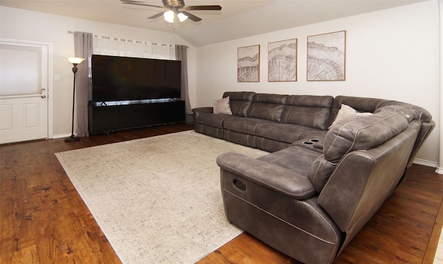 living room with lofted ceiling, dark wood-type flooring, and ceiling fan