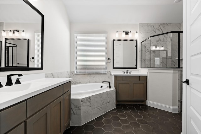 bathroom featuring vanity, plus walk in shower, and vaulted ceiling