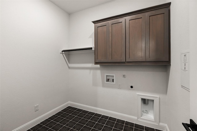 laundry room featuring cabinets, hookup for a gas dryer, hookup for a washing machine, and electric dryer hookup