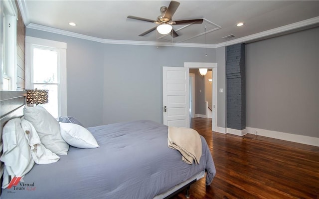 bedroom with dark hardwood / wood-style flooring, ceiling fan, and crown molding