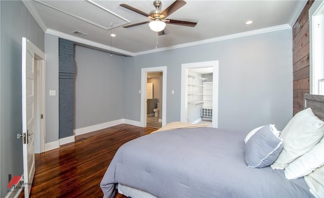 bedroom with ceiling fan, crown molding, ensuite bathroom, and dark hardwood / wood-style floors