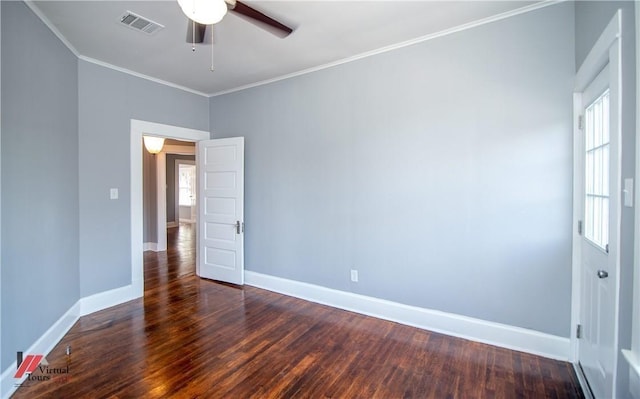 unfurnished room with dark hardwood / wood-style flooring, crown molding, ceiling fan, and a healthy amount of sunlight