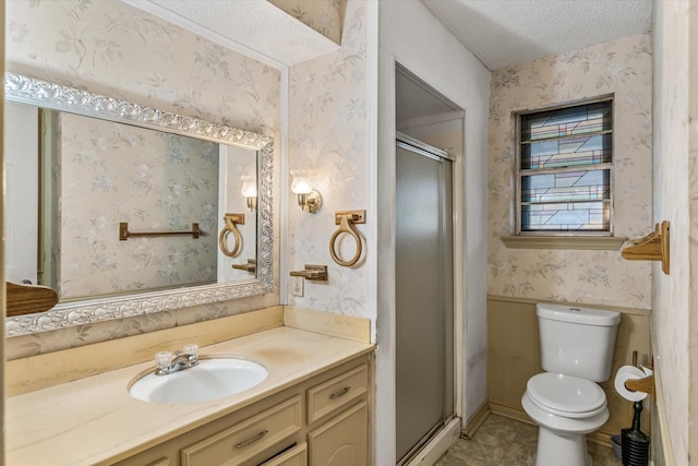 bathroom with a baseboard heating unit, vanity, a textured ceiling, toilet, and walk in shower