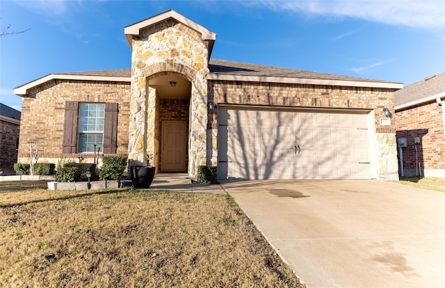 view of front of house with stone siding, concrete driveway, brick siding, and an attached garage