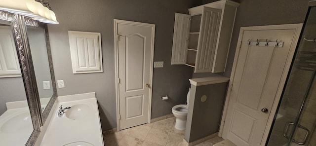 bathroom featuring vanity, an enclosed shower, tile patterned floors, and toilet