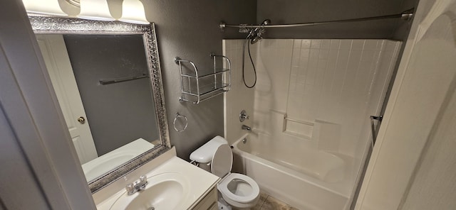 full bathroom featuring bathtub / shower combination, vanity, and toilet