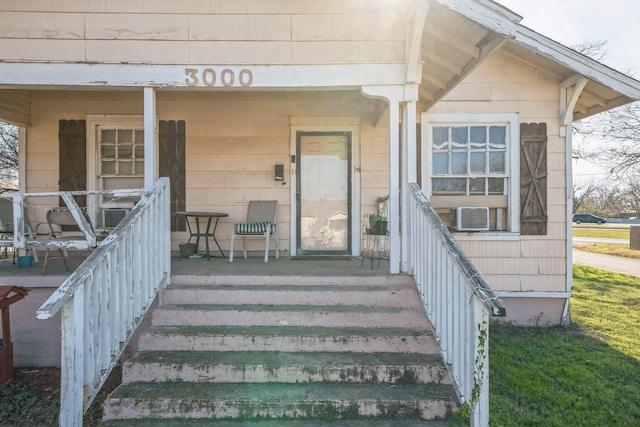 doorway to property featuring a porch