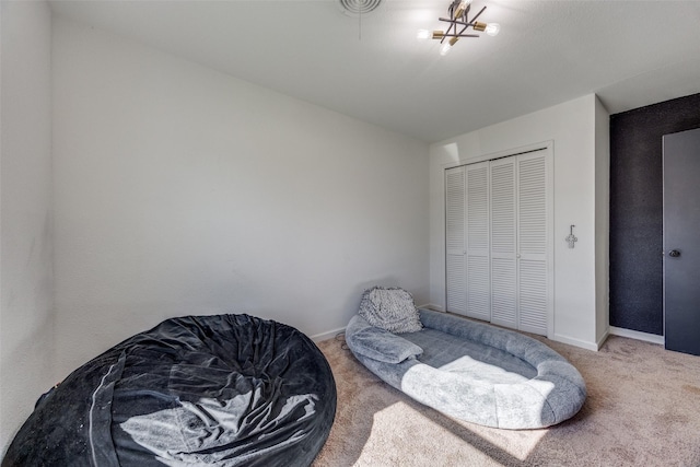 bedroom with a closet and carpet