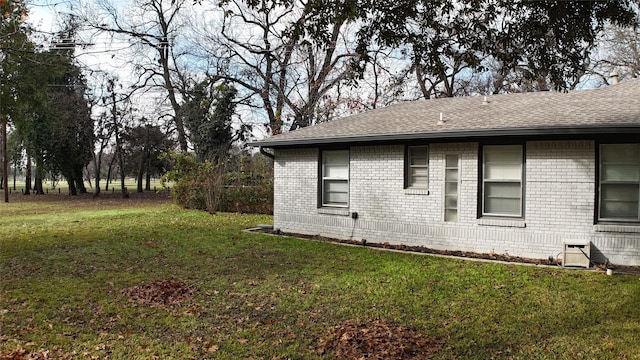 view of home's exterior featuring a lawn