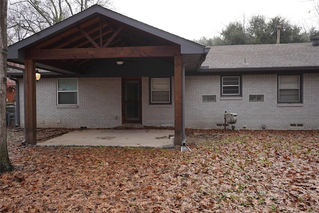 rear view of house featuring a patio area