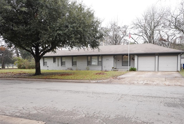 ranch-style house with a garage