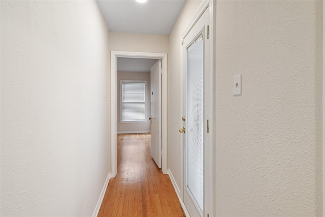 hall featuring light hardwood / wood-style flooring