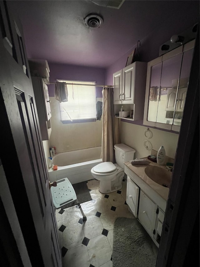 full bathroom featuring vanity, toilet, and shower / bathtub combination with curtain