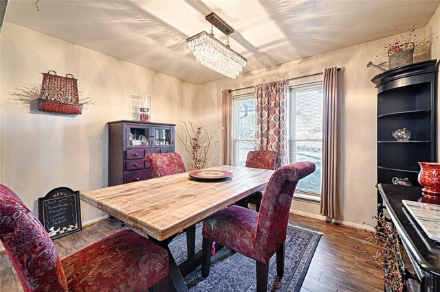 living room with hardwood / wood-style floors, a textured ceiling, ceiling fan, and crown molding