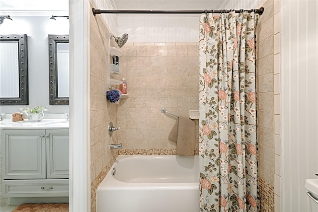 bathroom with shower / bath combination with curtain and vanity