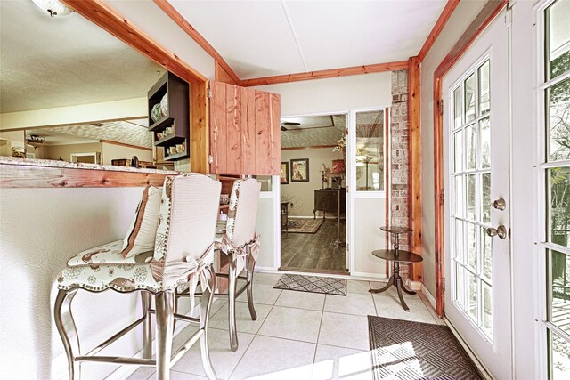 kitchen featuring dark hardwood / wood-style floors and ornamental molding