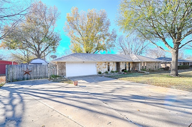 single story home with a garage and a front yard