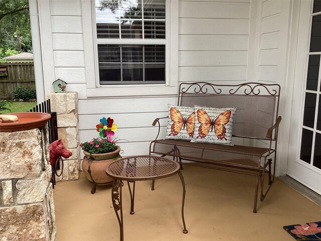 503 Mockingbird St, Bonham, TX 75418 - rear view of property with cooling unit, roof with shingles, a patio area, and french doors