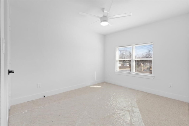 spare room with ceiling fan