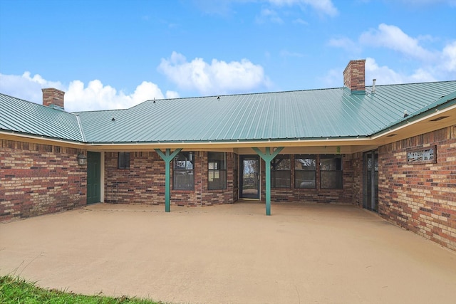 surrounding community with a patio area