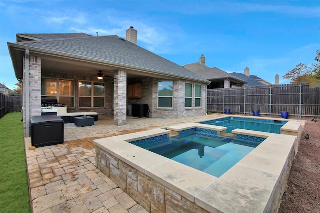 view of swimming pool featuring an outdoor living space, grilling area, ceiling fan, an in ground hot tub, and a patio