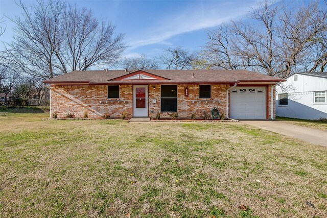 ranch-style house with a front yard and a garage