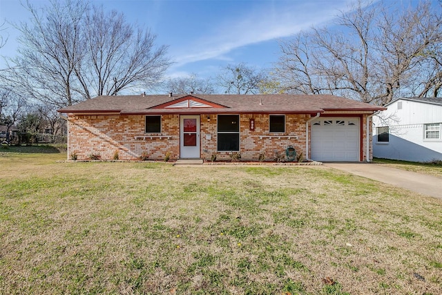 ranch-style home with a garage and a front lawn