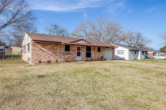 single story home featuring a front yard and a garage