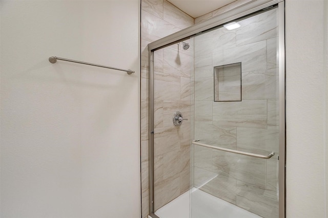 bathroom with an enclosed shower