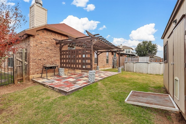 view of yard featuring a pergola and a patio area