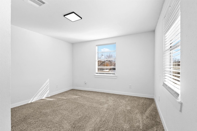 spare room featuring carpet flooring