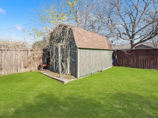 view of outdoor structure with a lawn