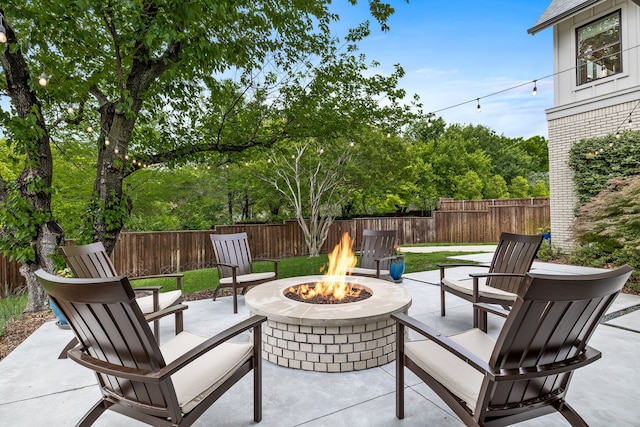 view of patio featuring a fire pit