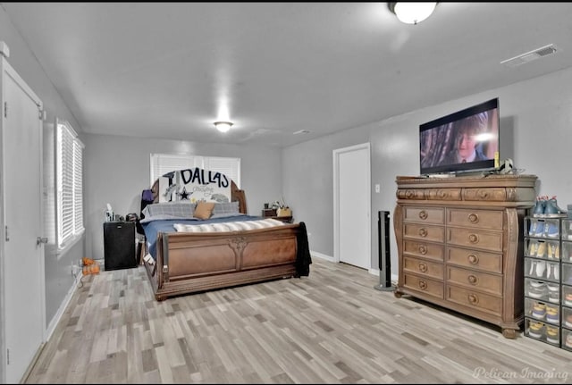 bedroom featuring light hardwood / wood-style flooring