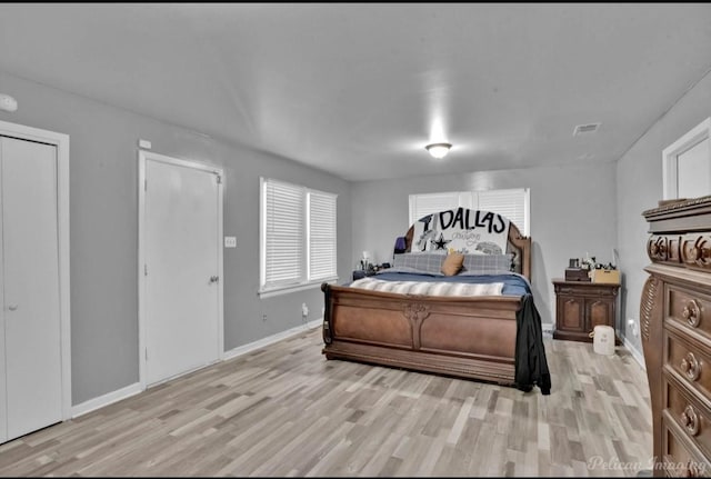 bedroom featuring light hardwood / wood-style floors