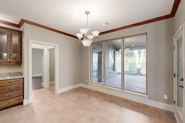 unfurnished dining area with crown molding, light tile patterned floors, and an inviting chandelier