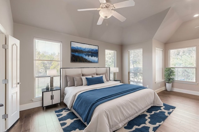 bedroom featuring ceiling fan and dark hardwood / wood-style flooring