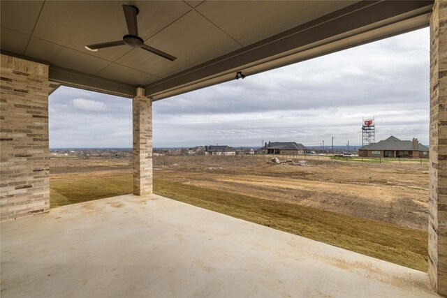 view of patio / terrace featuring ceiling fan