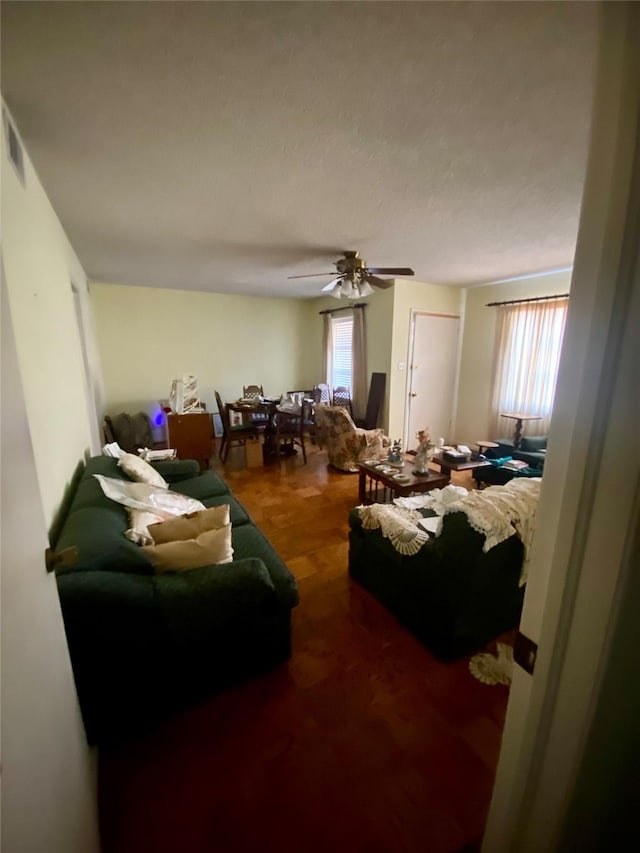 living room with ceiling fan