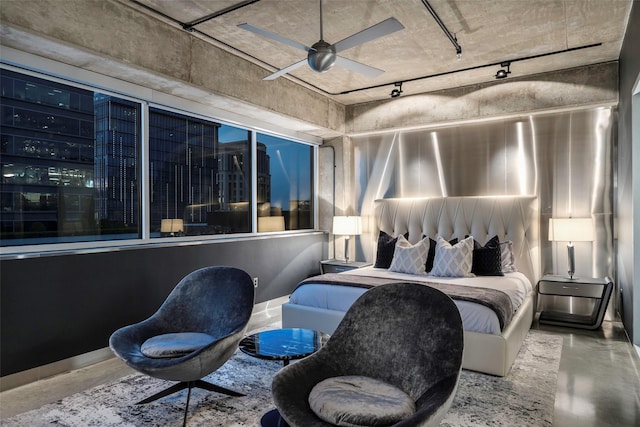 bedroom with concrete floors and ceiling fan