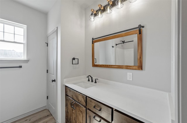 316 Clubview Dr, Bowie, TX 76230 - bathroom with vanity and wood finished floors
