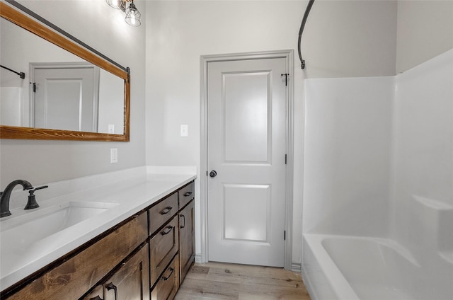 316 Clubview Dr, Bowie, TX 76230 - full bath with vanity and wood finished floors