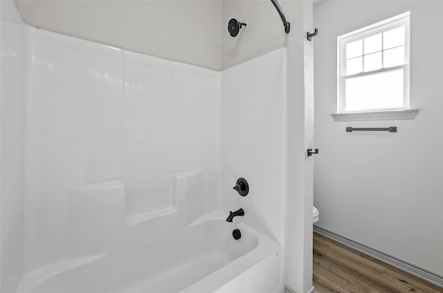 316 Clubview Dr, Bowie, TX 76230 - bathroom with  shower combination, toilet, and wood finished floors