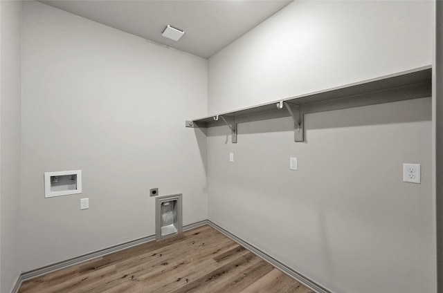 316 Clubview Dr, Bowie, TX 76230 - laundry area featuring light wood-style flooring, laundry area, washer hookup, and electric dryer hookup