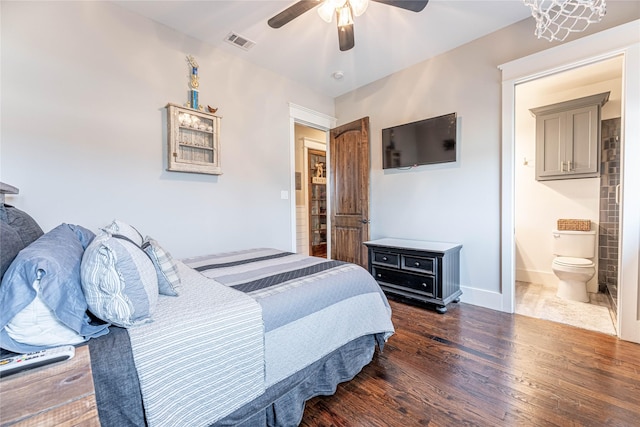 bedroom with ceiling fan, dark hardwood / wood-style flooring, and ensuite bathroom