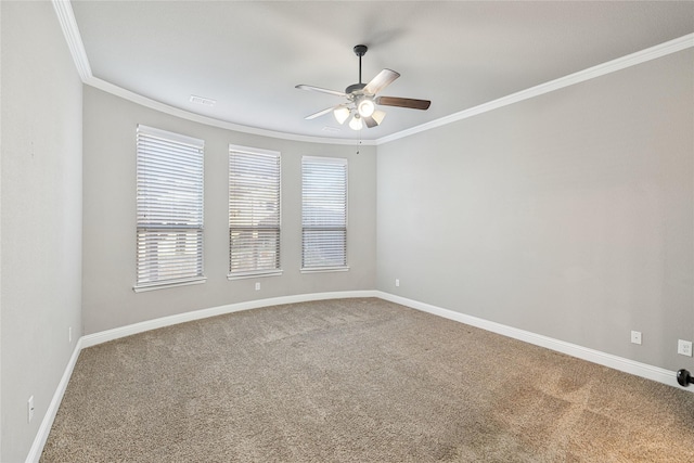 carpeted empty room featuring crown molding and ceiling fan