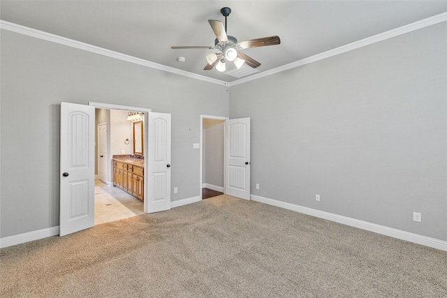 unfurnished bedroom with ensuite bath, ornamental molding, light colored carpet, ceiling fan, and a high ceiling