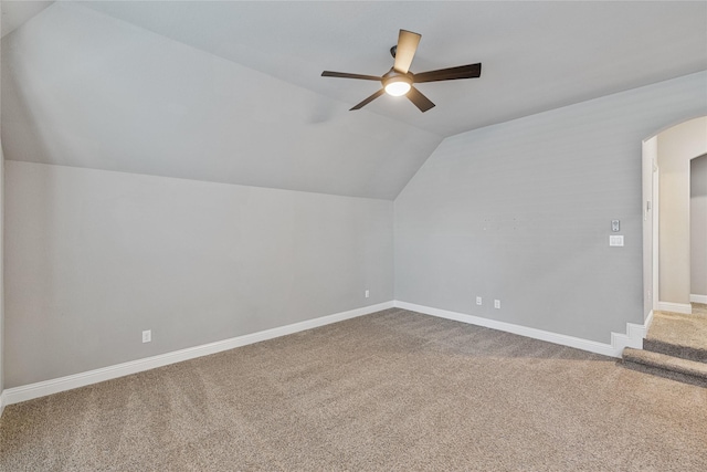 additional living space with ceiling fan, lofted ceiling, and carpet floors